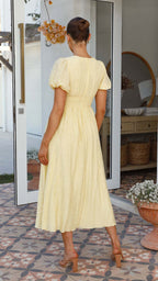 Long V-neck dress with puffed sleeves