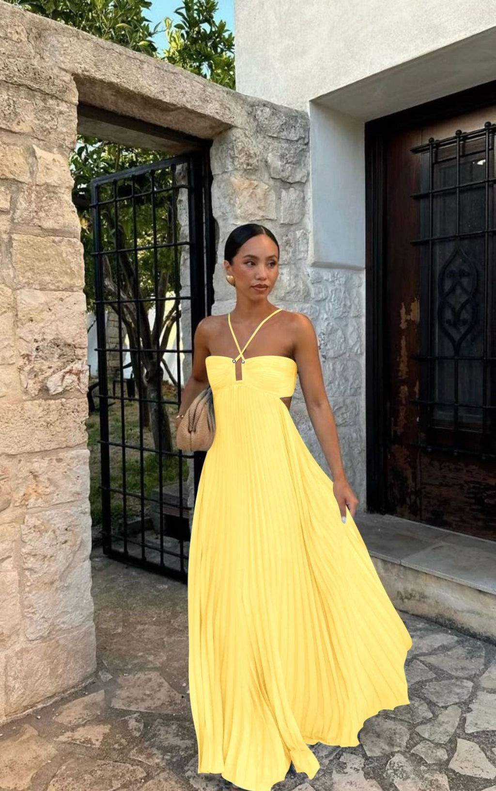Flowing pleated strapless dress